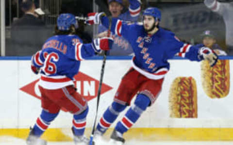 New York Rangers center Mika Zibanejad (93) celebrates with Rangers right wing Mats Zuccarello (36) in New York Rangers home jerseys (Brad Penner-USA TODAY Sports)