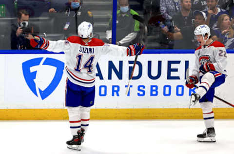 Cole Caufield and Nick Suzuki (Photo by Mike Ehrmann/Getty Images)