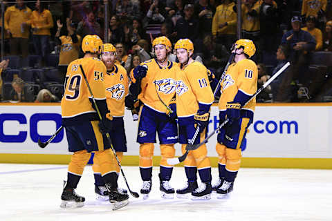 NASHVILLE, TN – NOVEMBER 17: Nashville Predators defenseman Roman Josi (59), defenseman Ryan Ellis (4), winger Colton Sissons (10) and winger Calle Jarnkrok (19) congratulate center Kyle Turris (8) following his second period goal during the NHL game between the Nashville Predators and Los Angeles Kings, held on November 17, 2018, at Bridgestone Arena in Nashville, Tennessee. (Photo by Danny Murphy/Icon Sportswire via Getty Images)