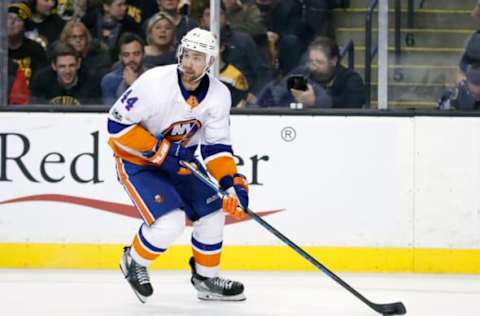 BOSTON, MA – DECEMBER 09: New York Islanders defenseman Calvin De Haan (44) looks to pass during a game between the Boston Bruins and the New York Islanders on December 9, 2017, at TD Garden in Boston, Massachusetts, The Bruins defeated the Islanders 3-1. (Photo by Fred Kfoury III/Icon Sportswire via Getty Images)