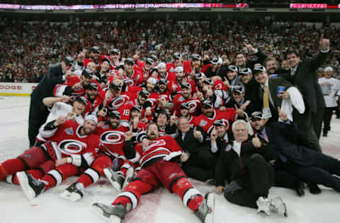 RALEIGH, NC – JUNE 19: The Carolina Hurricanes pose together with the Stanley Cup after defeating the Edmonton Oilers in game seven of the 2006 NHL Stanley Cup Finals on June 19, 2006 at the RBC Center in Raleigh, North Carolina. The Hurricanes defeated the Oilers 3-1 to win the Stanley Cup finals 4 games to 3.(Photo by Jim McIsaac/Getty Images)