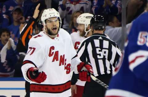 NEW YORK, NEW YORK – MAY 28: Tony DeAngelo #77 of the Carolina Hurricanes argues a call during the game against the New York Rangers in Game Six of the Second Round of the 2022 Stanley Cup Playoffs at Madison Square Garden on May 28, 2022, in New York City. The Rangers defeated the Hurricanes 5-2. (Photo by Bruce Bennett/Getty Images)