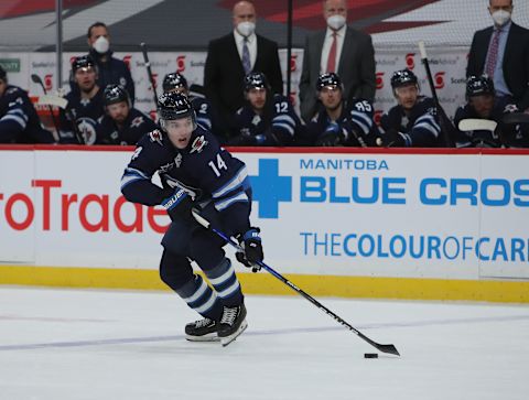 Winnipeg Jets, Ville Heinola #14. (Photo by Jason Halstead/Getty Images)