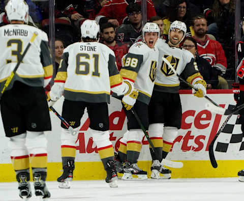 RALEIGH, NC – JANUARY 31: Nate Schmidt #88 of the Vegas Golden Knights scores a goal and celebrates with teammates Chandler Stephenson #20 and Mark Stone #61 during an NHL game against the Carolina Hurricanes on January 31, 2020 at PNC Arena in Raleigh, North Carolina. (Photo by Gregg Forwerck/NHLI via Getty Images)