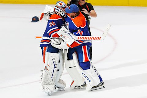 Apr 1, 2023; Edmonton, Alberta, CAN; Edmonton Oilers goaltender Stuart Skinner (74) celebrates with goaltender Jack Campbell (36) after his 6-0 victory over the Anaheim Ducks. The win was goaltender Jack Campbell (36) first shout-out as an Edmonton Oilers at Rogers Place. Mandatory Credit: Perry Nelson-USA TODAY Sports