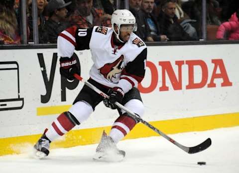 November 9, 2015; Anaheim, CA, USA; Arizona Coyotes left wing Anthony Duclair (10) controls the puck against Anaheim Ducks during the first period at Honda Center. Mandatory Credit: Gary A. Vasquez-USA TODAY Sports