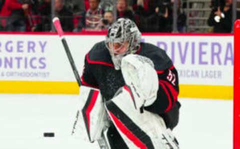 Nov 15, 2023; Raleigh, North Carolina, USA; Carolina Hurricanes goaltender Pyotr Kochetkov (52) goes out to stops the shot against the Philadelphia Flyers during the second period at PNC Arena. Mandatory Credit: James Guillory-USA TODAY Sports