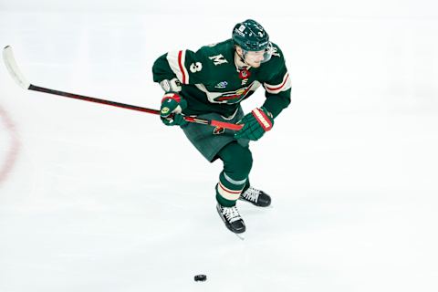 John Klingberg #3 of the Minnesota Wild skates with the puck  (Photo by David Berding/Getty Images)