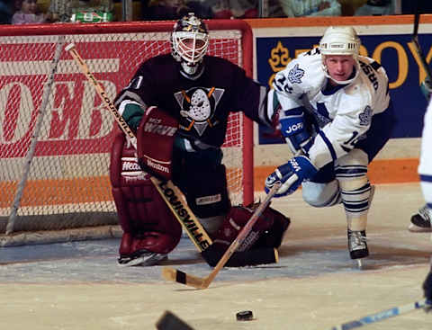 TORONTO, ON – JANUARY 18: Nikolai Borschevsky #16 of the Toronto Maple Leafs skates against Guy Hebert #31 of the Mighty Ducks of Anaheim during NHL game action on January 18, 1994 at Maple Leaf Gardens in Toronto, Ontario, Canada. (Photo by Graig Abel/Getty Images)