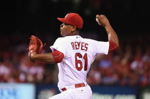 Aug 23, 2016; St. Louis, MO, USA; St. Louis Cardinals starting pitcher Alex Reyyes (61) pitches to a New York Mets batter during the sixth inning at Busch Stadium. The Mets won 7-4. Mandatory Credit: Jeff Curry-USA TODAY Sports