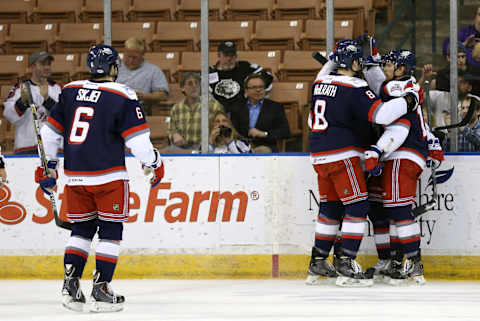 May 21, 2015: Hartford celebrates their first goal from Hartford Wolf Pack Center Oscar Lindberg (24). The Manchester Monarchs defeated the Hartford Wolf Pack 3-2 in Game 1 of the Eastern Conference Finals of the 2015 AHL Calder Cup playoffs at Verizon Wireless Arena in Manchester, NH. (Photo by Fred Kfoury III/Icon Sportswire/Corbis via Getty Images)