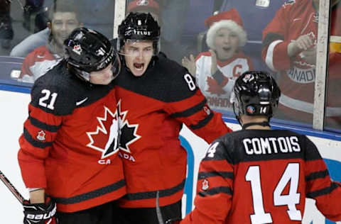 VICTORIA, BC – DECEMBER 19: Cody Glass #8 of Team Canada celebrates his goal with teammates (L-R) Owen Tippett #21 and Maxime Comtois #14 versus Team Switzerland at the IIHF World Junior Championships at the Save-on-Foods Memorial Centre on December 19, 2018, in Victoria, British Columbia, Canada. Canada defeated Switzerland 5-3. (Photo by Kevin Light/Getty Images)”n”n”n”n