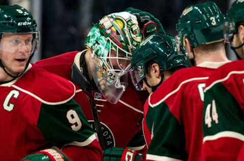 NHL Power Rankings: Minnesota Wild goalie Devan Dubnyk (40) celebrates following the game with teammates against the Colorado Avalanche at Xcel Energy Center. The Wild defeated the Avalanche 2-0. Mandatory Credit: Brace Hemmelgarn-USA TODAY Sports