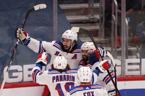 New York Rangers center Mika Zibanejad (93) celebrates with teammates after scoring the go ahead goal Credit: Geoff Burke-USA TODAY Sports