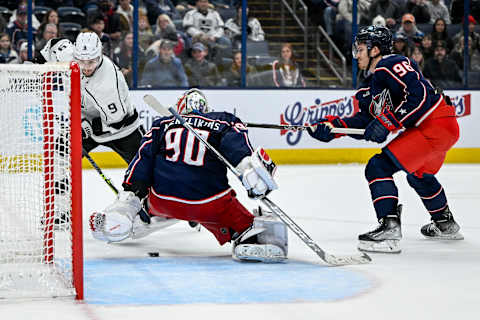 Dec 11, 2022; Columbus, Ohio, USA; Columbus Blue Jackets goaltender Elvis Merzlikins (90) stops a shot from Los Angeles Kings right wing Adrian Kempe (9) in the third period at Nationwide Arena. Mandatory Credit: Gaelen Morse-USA TODAY Sports