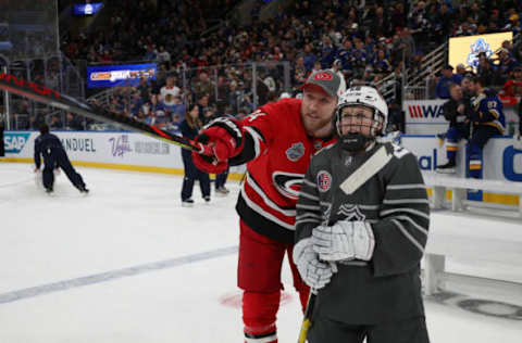 ST LOUIS, MISSOURI – JANUARY 24: Jaccob Slavin of the Carolina Hurricanes and Kendall Coyne Schofield #26 of the American All-Stars take part in the 2020 NHL All-Star Skills competition at Enterprise Center on January 24, 2020 in St Louis, Missouri. (Photo by Dave Sandford/NHLI via Getty Images)