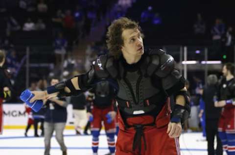 NEW YORK, NEW YORK – APRIL 13: Artemi Panarin #10 of the New York Rangers throws a t-shirt to fans following a 3-2 loss to the Toronto Maple Leafs at Madison Square Garden on April 13, 2023, in New York City. (Photo by Bruce Bennett/Getty Images)