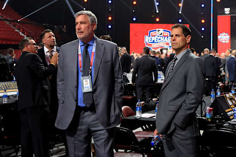 MONTREAL, QUEBEC – JULY 07: President Cam Neely and General Manager Don Sweeny of the Boston Bruins look on during Round One of the 2022 Upper Deck NHL Draft at Bell Centre on July 07, 2022 in Montreal, Quebec, Canada. (Photo by Bruce Bennett/Getty Images)