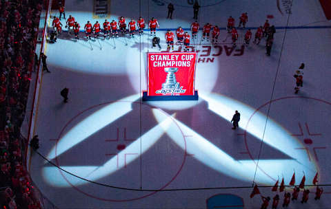 WASHINGTON, DC – OCTOBER 3: The Washington Capitals raise their Stanley Cup Championship banner during a pregame ceremony prior to action against the Boston Bruins at Capital One Arena. (Photo by Jonathan Newton / The Washington Post via Getty Images)