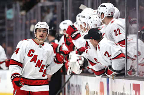 ANAHEIM, CALIFORNIA – NOVEMBER 18: Seth Jarvis #24 of the Carolina Hurricanes is congratulated at the bench after scoring a goal during the third period of a game against the Anaheim Ducks at Honda Center on November 18, 2021 in Anaheim, California. (Photo by Sean M. Haffey/Getty Images)