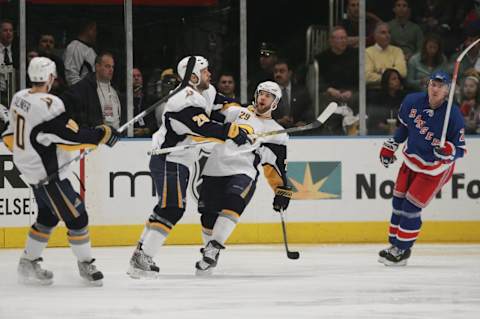 NEW YORK – MAY 6: Jason Pominville #29 of the Buffalo Sabres celebrates with teammates Paul Gaustad #28 and Henrik Tallinder #10 against the New York Rangers in Game 6 of the Eastern Conference Semifinals during the 2007 NHL Stanley Cup Playoffs on May 6, 2007 at Madison Square Garden in New York City. The Sabres defeated the Rangers 5-4. (Photo by Bruce Bennett/Getty Images)