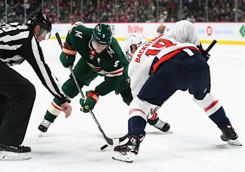 ST. PAUL, MN – FEBRUARY 15: Minnesota Wild Center Mikko Koivu (9) and Washington Capitals Center Nicklas Backstrom (19) face-off during a NHL game between the Minnesota Wild and Washington Capitals on February 15, 2018 at Xcel Energy Center in St. Paul, MN. The Capitals defeated the Wild 5-2. (Photo by Nick Wosika/Icon Sportswire via Getty Images)