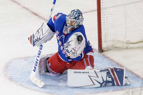 NEW YORK, NY – MARCH 06: New York Rangers goaltender Henrik Lundqvist (30) makes save during the Winnipeg Jets and New York Rangers NHL game on March 6, 2018, at Madison Square Garden in New York, NY. (Photo by John Crouch/Icon Sportswire via Getty Images)