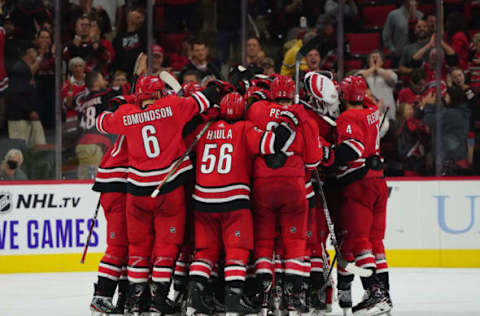 RALEIGH, NC – OCTOBER 3: The Carolina Hurricanes celebrate a victory over the Montreal Canadiens following overtime of an NHL game on October 3, 2019 at PNC Arena in Raleigh North Carolina. (Photo by Gregg Forwerck/NHLI via Getty Images)