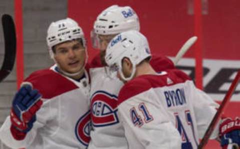 Feb 23, 2021; Ottawa, Ontario, CAN; Montreal Canadiens Jake Evans (71) and Paul Byron Mandatory Credit: Marc DesRosiers-USA TODAY Sports