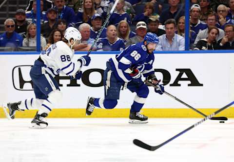 Apr 22, 2023; Tampa, Florida, USA; Tampa Bay Lightning right wing Nikita Kucherov (86) skates with the puck against Toronto Maple Leafs right wing William Nylander (88) during the third period in game three of the first round of the 2023 Stanley Cup Playoffs at Amalie Arena. Mandatory Credit: Kim Klement-USA TODAY Sports