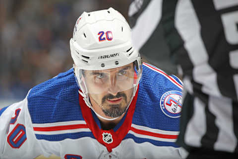 TORONTO, ON – OCTOBER 18: Chris Kreider #20 of the New York Rangers gets set for a faceoff against the Toronto Maple Leafs during an NHL game at Scotiabank Arena on October 18, 2021 in Toronto, Ontario, Canada. The Rangers defeated the Maple Leafs 2-1 in overtime. (Photo by Claus Andersen/Getty Images)