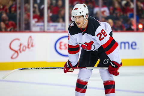 Nov 5, 2022; Calgary, Alberta, CAN; New Jersey Devils defenseman Damon Severson (28) against the Calgary Flames during the third period at Scotiabank Saddledome. Mandatory Credit: Sergei Belski-USA TODAY Sports