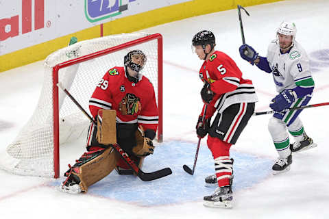 CHICAGO, ILLINOIS – JANUARY 31: Marc-Andre Fleury #29 of the Chicago Blackhawks reacts after a goal by Brock Boeser #6 of the Vancouver Canucks during the second period at United Center on January 31, 2022, in Chicago, Illinois. (Photo by Stacy Revere/Getty Images)