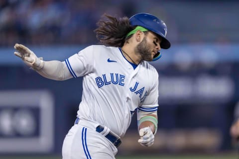 Jul 15, 2023; Toronto, Ontario, CAN; Toronto Blue Jays shortstop Bo Bichette (11) rounds third base after hitting a home run against the Arizona Diamondbacks during the eighth inning at Rogers Centre. Mandatory Credit: Kevin Sousa-USA TODAY Sports