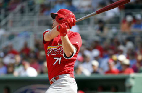 Feb 27, 2017; Fort Myers, FL, USA; St. Louis Cardinals catcher Carson Kelly (71) hits a RBI single during the third inning against the Boston Red Sox at JetBlue Park. Mandatory Credit: Kim Klement-USA TODAY Sports