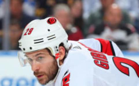 BUFFALO, NY – NOVEMBER 14: Brian Gibbons #29 of the Carolina Hurricanes prepares for a face-off during his 200th NHL game against the Buffalo Sabres on November 14, 2019 at KeyBank Center in Buffalo, New York. (Photo by Sara Schmidle/NHLI via Getty Images)