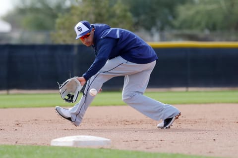 PEORIA, AZ – FEBRUARY 25: Mannny Machado #13 of the San Diego Padres fields ground balls during a workout on Monday, February 25, 2019 at Peoria Sports Complex in Peoria, Arizona. (Photo by Allex Trautwig/MLB Photos via Getty Images)