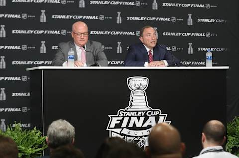 BOSTON, MASSACHUSETTS – MAY 27: (L-R) Deputy commissioner Bill Daly and Commissioner Gary Bettman of the National Hockey League speak with the media prior to Game One of the 2019 NHL Stanley Cup Final at TD Garden on May 27, 2019 in Boston, Massachusetts. (Photo by Bruce Bennett/Getty Images)