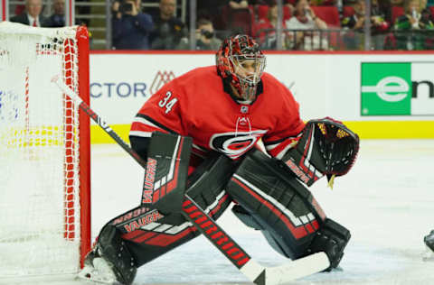 RALEIGH, NC – OCTOBER 26: Petr Mrazek #34 of the Carolina Hurricanes crouches in the crease to protect the net during an NHL game against the Chicago Blackhawks on October 26, 2019 at PNC Arena in Raleigh North Carolina. (Photo by Gregg Forwerck/NHLI via Getty Images)