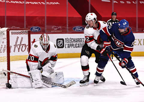 Feb 04, 2021; Montreal, Quebec, CAN; Ottawa Senators defenseman Thomas Chabot (72) defends   Credit: Jean-Yves Ahern-USA TODAY Sports