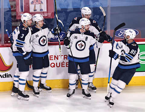 Winnipeg Jets, Josh Morrissey (44). Mandatory Credit: Jean-Yves Ahern-USA TODAY Sports