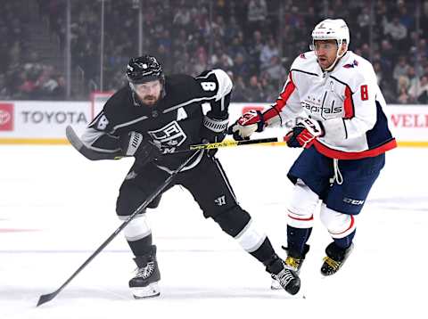 LOS ANGELES, CALIFORNIA – DECEMBER 04: Drew Doughty #8 of the Los Angeles Kings holds on to the stick of Alex Ovechkin #8 of the Washington Capitals during the second period at Staples Center on December 04, 2019 in Los Angeles, California. (Photo by Harry How/Getty Images)