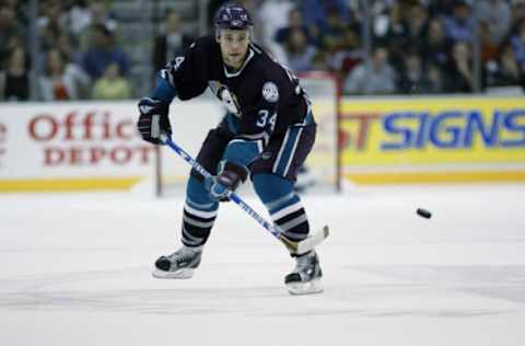 Kurt Sauer skating for The Mighty Ducks of Anaheim in 2003. (Photo by Brian Bahr/Getty Images/NHLI)