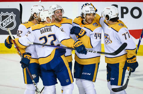 Nashville Predators left wing Kiefer Sherwood (44) celebrates his goal with teammates against the Calgary Flames during the first period at Scotiabank Saddledome. Mandatory Credit: Sergei Belski-USA TODAY Sports