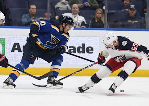 ST. LOUIS, MO – OCTOBER 25: St. Louis Blues center Brayden Schenn (10) and Columbus Blue Jackets defenseman Marcus Nutivaara (65) battle for the puck during a NHL game between the Columbus Blue Jackets and the St. Louis Blues on October 25, 2018, at Enterprise Center, St. Louis, MO. (Photo by Keith Gillett/Icon Sportswire via Getty Images)