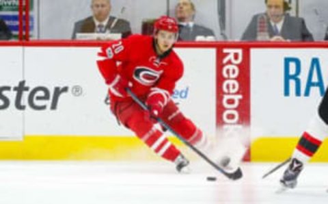 NHL Power Rankings: Carolina Hurricanes forward Sebastian Aho (20) skates with the puck against the New Jersey Devils at PNC Arena. The New Jersey Devils defeated the Carolina Hurricanes 3-1. Mandatory Credit: James Guillory-USA TODAY Sports