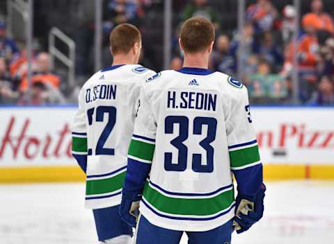 Daniel Sedin #22, Henrik Sedin #33, Vancouver Canucks (Photo by Andy Devlin/NHLI via Getty Images)