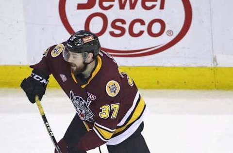 ROSEMONT, ILLINOIS – JUNE 08: Zac Leslie #37 of the Chicago Wolves shoots against the Charlotte Checkers during game Five of the Calder Cup Finals at Allstate Arena on June 08, 2019, in Rosemont, Illinois. The Checkers defeated the Wolves 5-3 to win the Calder Cup. (Photo by Jonathan Daniel/Getty Images)