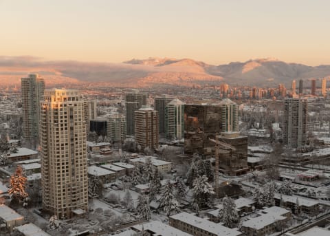 BURNABY, BRITISH COLUMBIA – DECEMBER 21: An aerial view of metro Vancouver is seen at sunrise on December 21, 2022 in Burnaby, British Columbia, Canada. Vancouver is currently under an arctic outflow warning, with winds creating temperatures that feel like -20 celsius. (Photo by Andrew Chin/Getty Images)