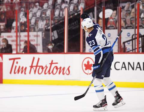 Winnipeg Jets, Trevor Lewis #23. (Photo by Chris Tanouye/Getty Images)